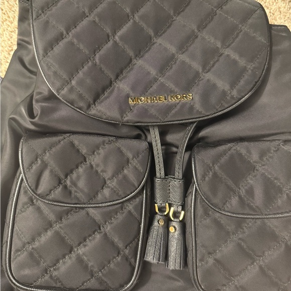 Michael Kors Black Quilted Backpack with Gold Accents - Picture 1 of 7